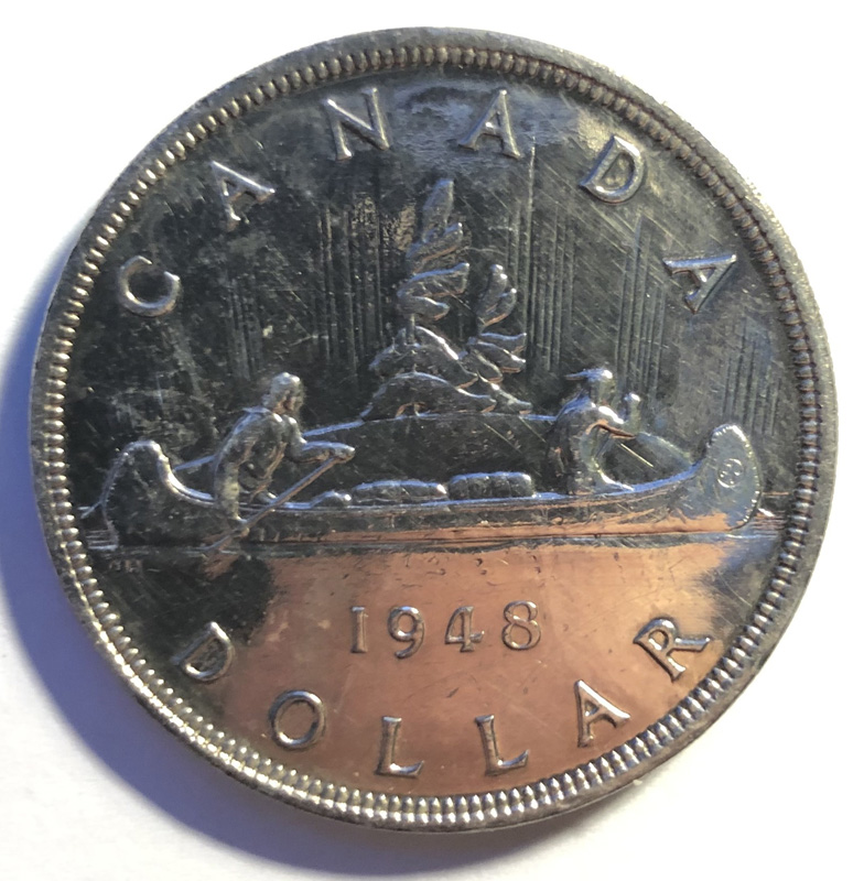 Reverse showing Voyageurs and 1948
