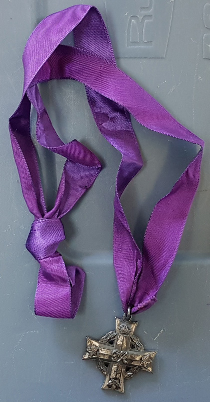 Medal with purple ribbon