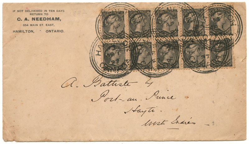 front of envelope with stamps and handwritten address