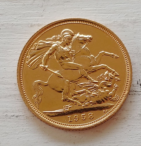 G.B. 1958 QEII Gold Sovereign lt scratch .234oz AGW