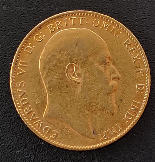 G.B. XF 1909 Edward VII Gold Sovereign, trifle verdigris .235oz AGW