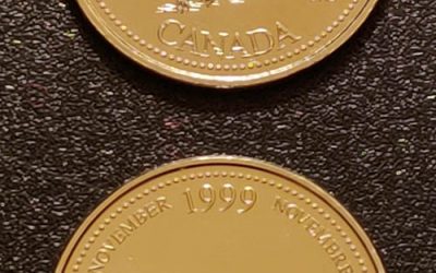 November 1999 BU no denomination 25c w/ normal to compare