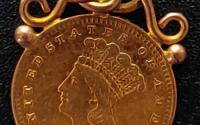 U.S.A. 1856 Indian Princess Gold Dollar w/ original mount.04837+oz