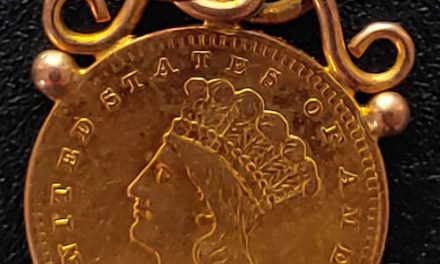 U.S.A. 1856 Indian Princess Gold Dollar w/ original mount.04837+oz